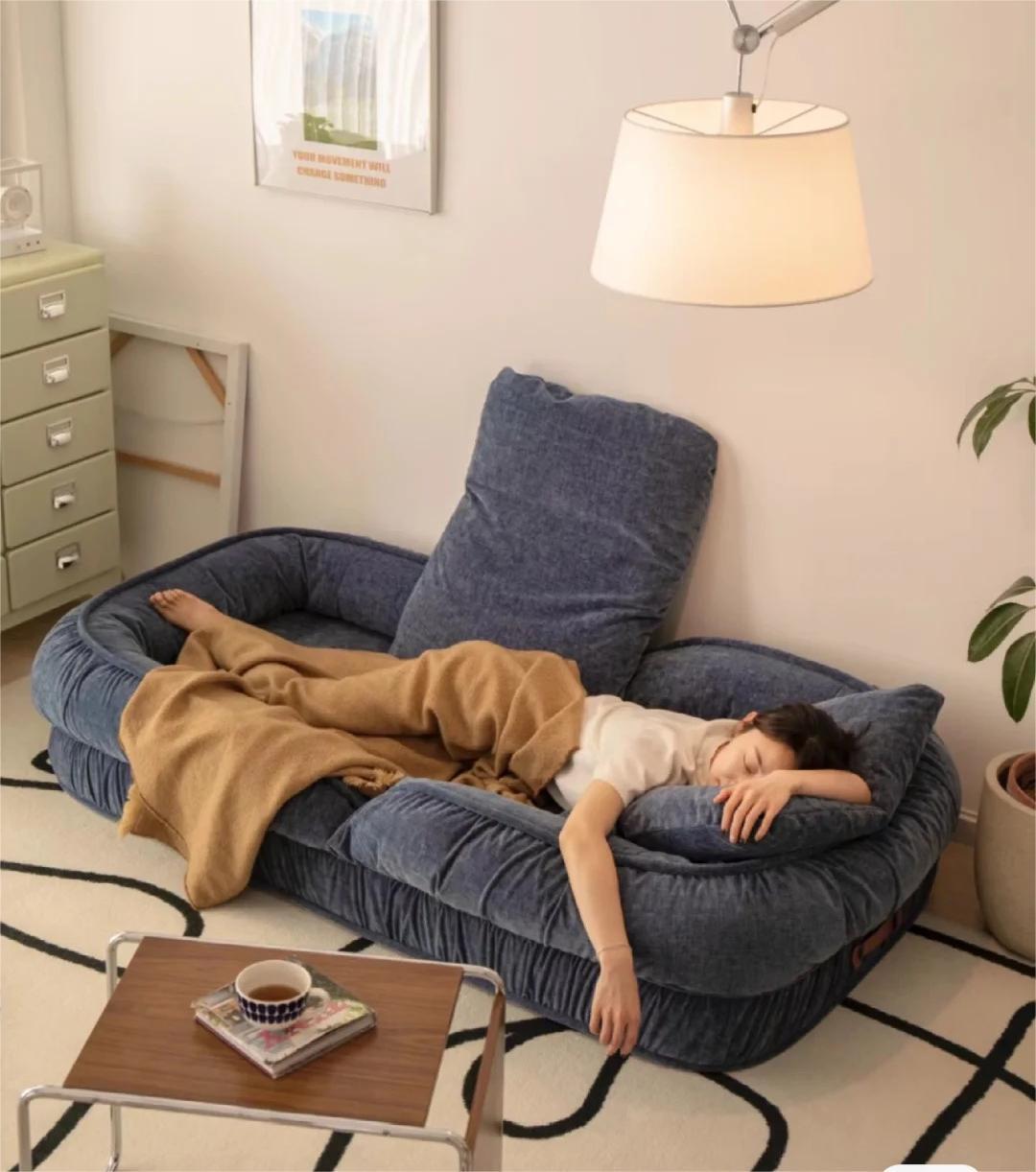 Pluf Haven™ – The Ultimate Human Comfort Bed by Merry Wonders being used for relaxing and napping 2