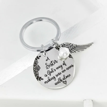 A Sister is God's Way of Making Sure We Never Walk Alone Keychain