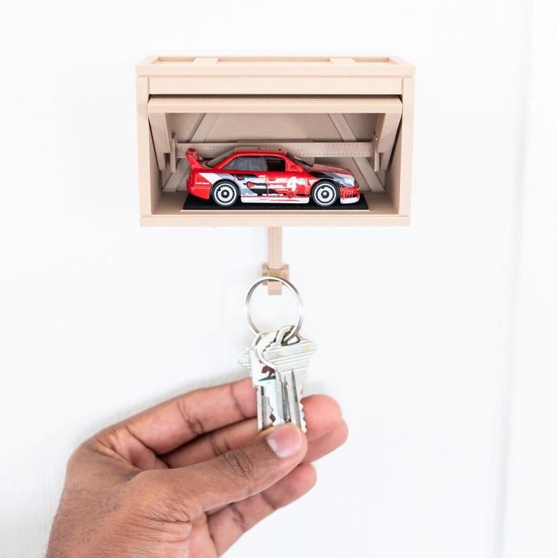 🔥Hot Sale 49% OFF🔥 🚗🔑Auto Garage Key Holder - Interactive Opening Door
