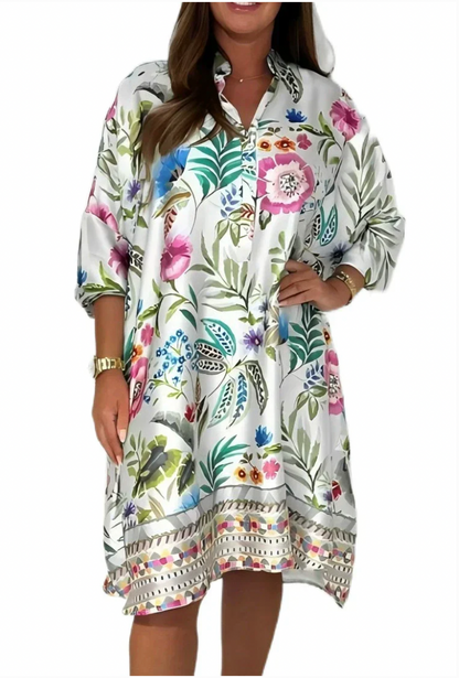 Loose dress with V-neck and half button placket with floral pattern