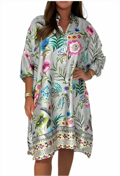 Loose dress with V-neck and half button placket with floral pattern