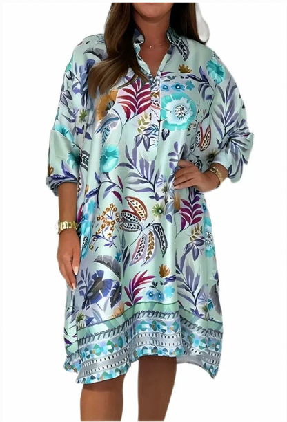 Loose dress with V-neck and half button placket with floral pattern