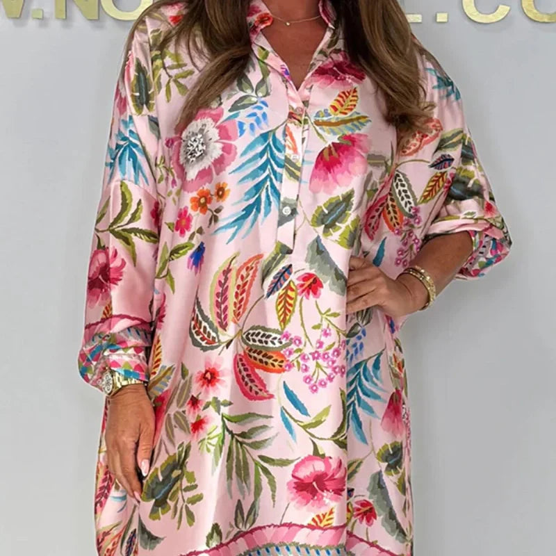 Loose dress with V-neck and half button placket with floral pattern