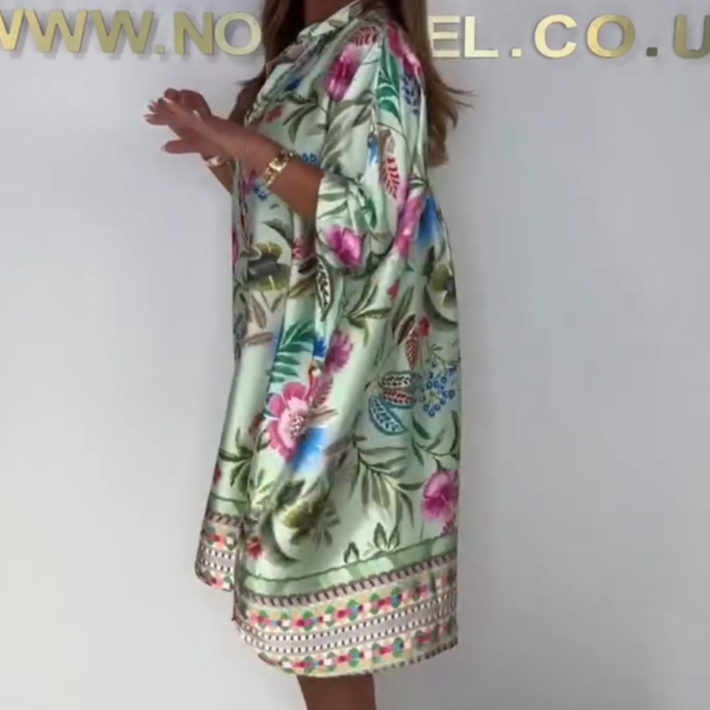 Loose dress with V-neck and half button placket with floral pattern